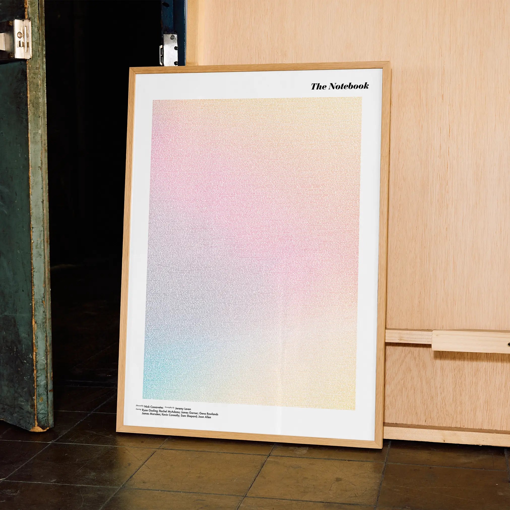 A framed The Notebook movie script poster displayed in a contemporary interior setting.