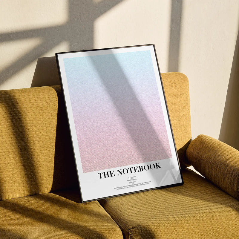 A framed The Notebook movie script poster styled in a clean interior setting.