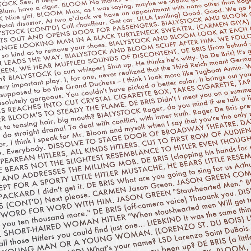 Close-up detail of the The Producers movie script poster showing dense typographic text.