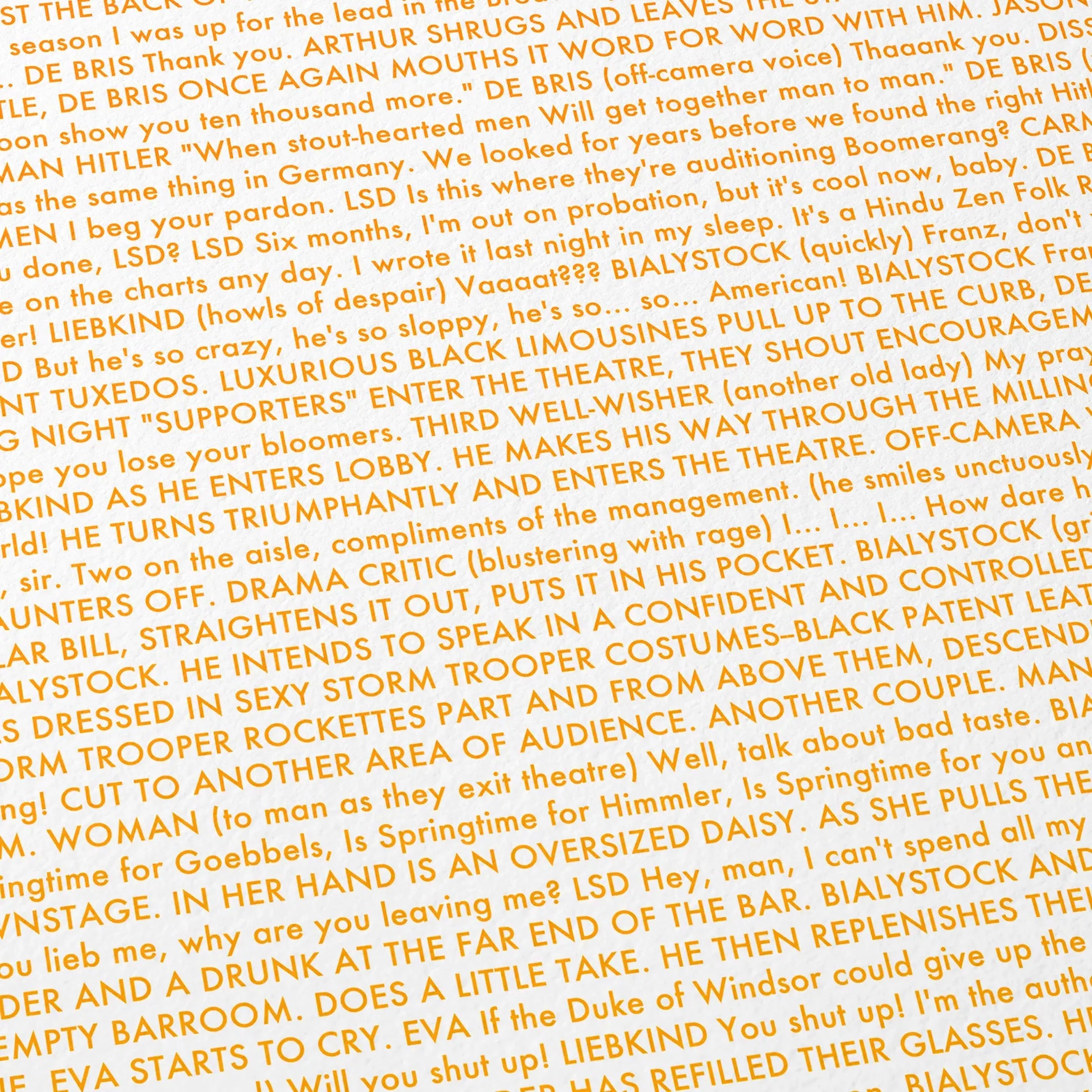 Close-up detail of the The Producers movie script poster showing dense typographic text.