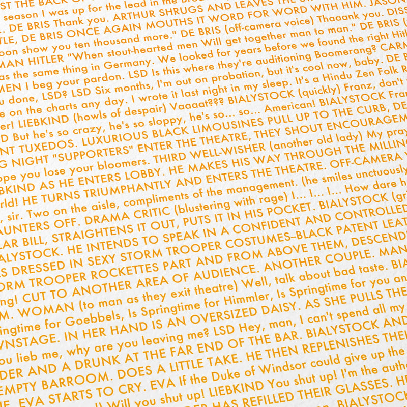 Close-up detail of the The Producers movie script poster showing dense typographic text.