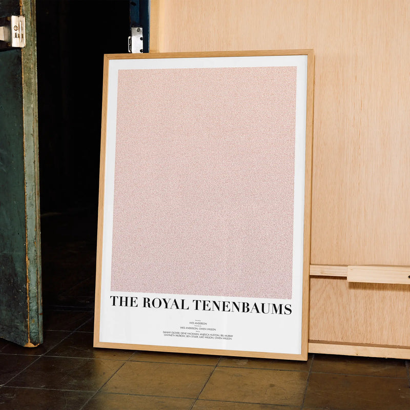A framed The Royal Tenenbaums movie script poster displayed in a contemporary interior setting.