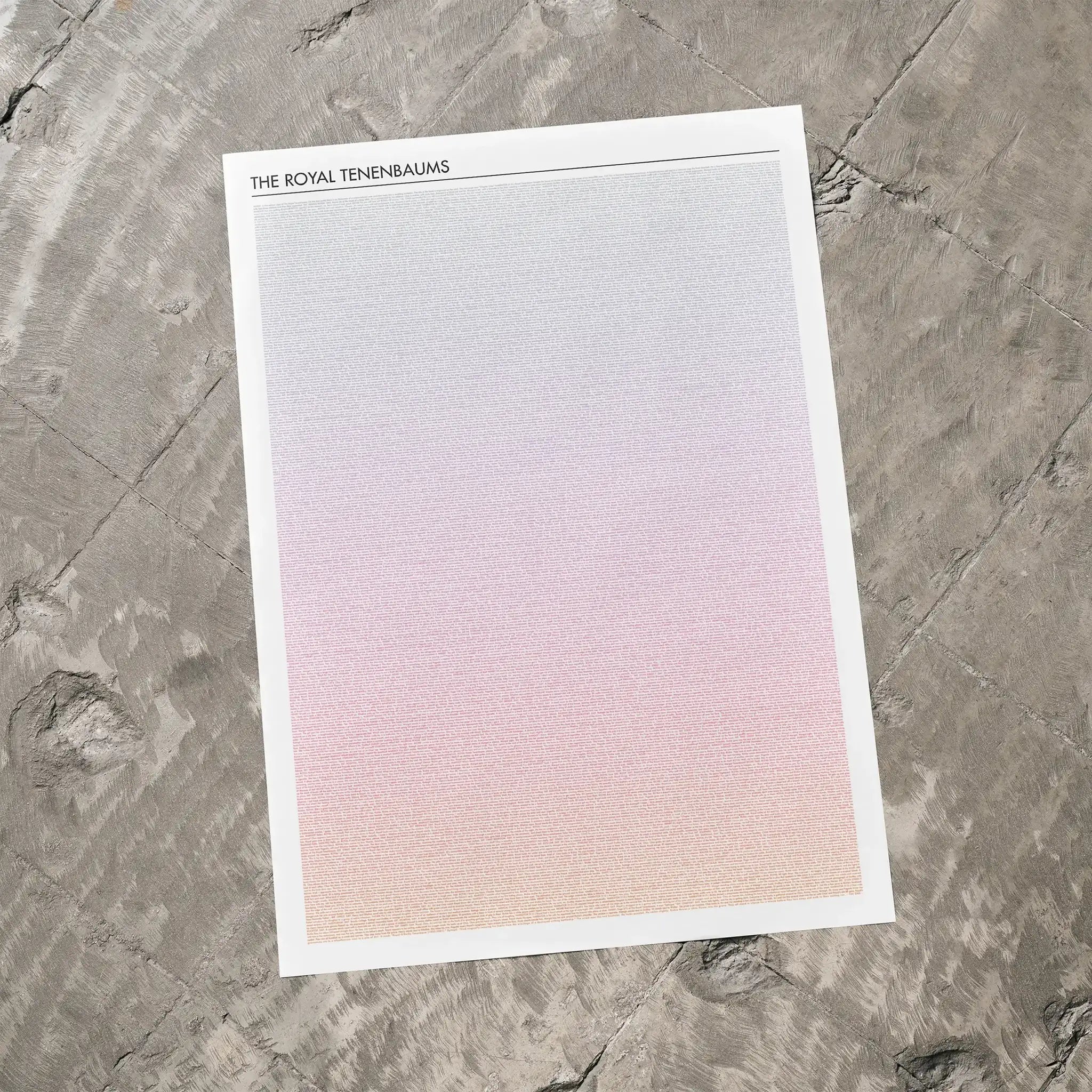 A The Royal Tenenbaums movie script poster laid flat on a textured floor surface.