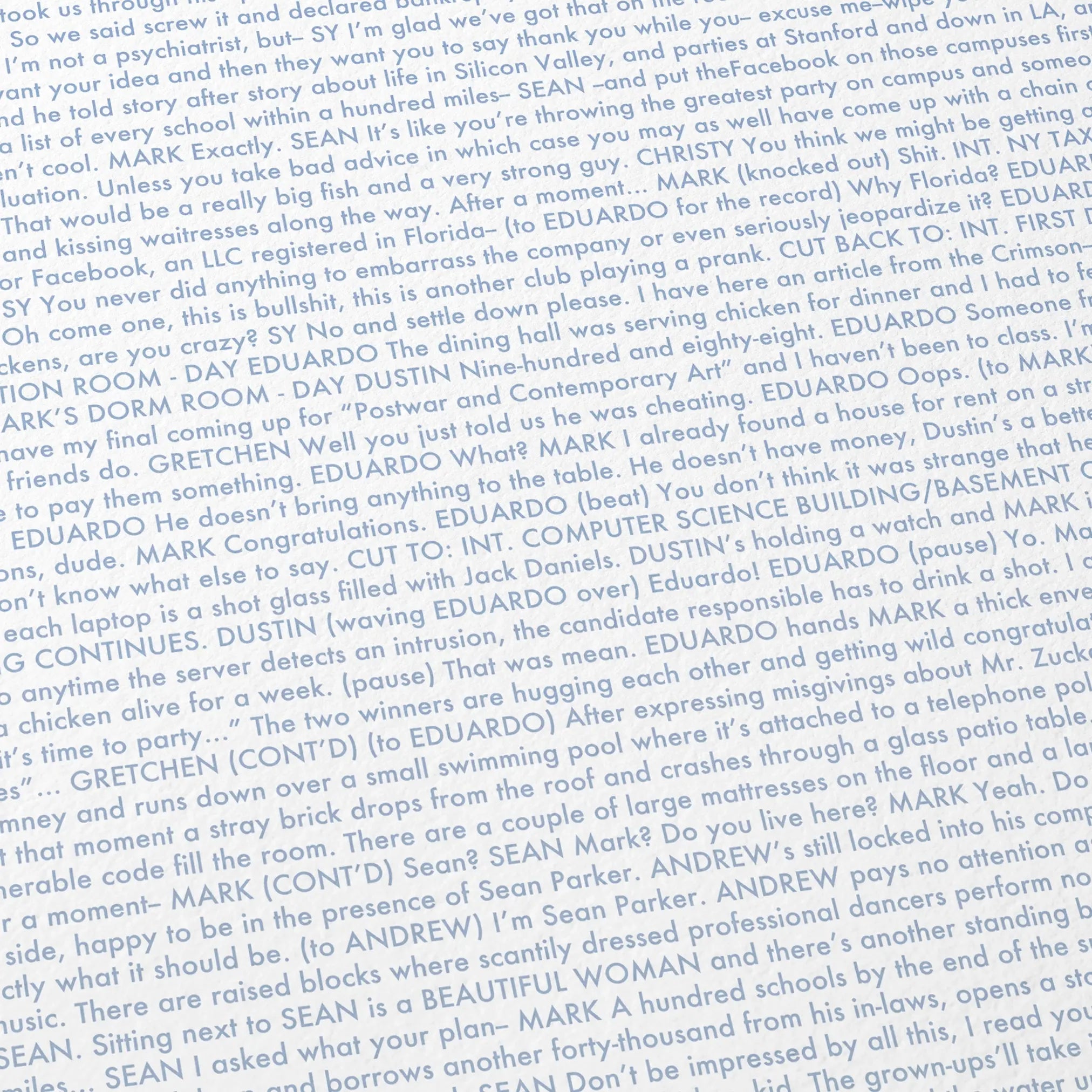 Close-up detail of the The Social Network movie script poster showing dense typographic text.