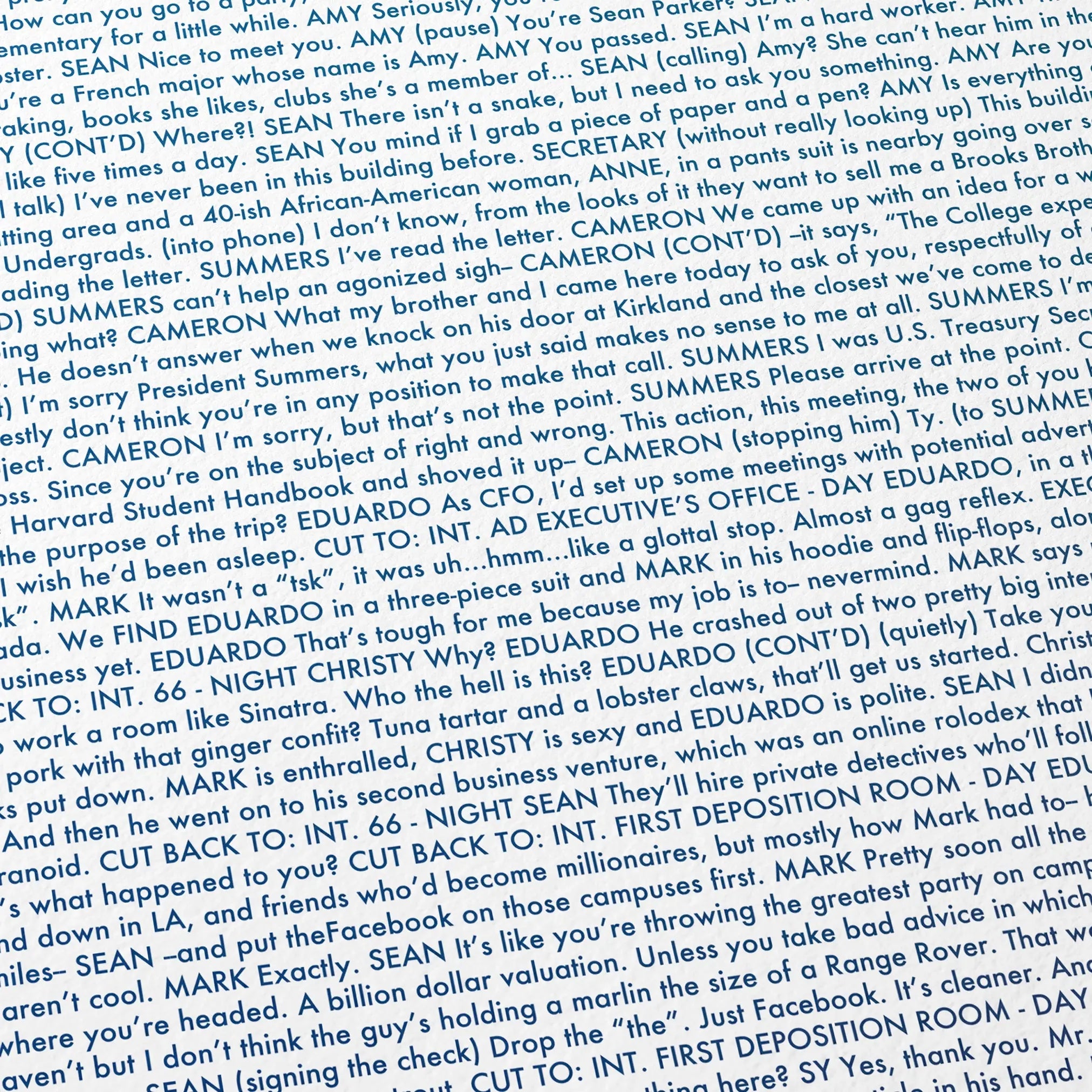Close-up detail of the The Social Network movie script poster showing dense typographic text.