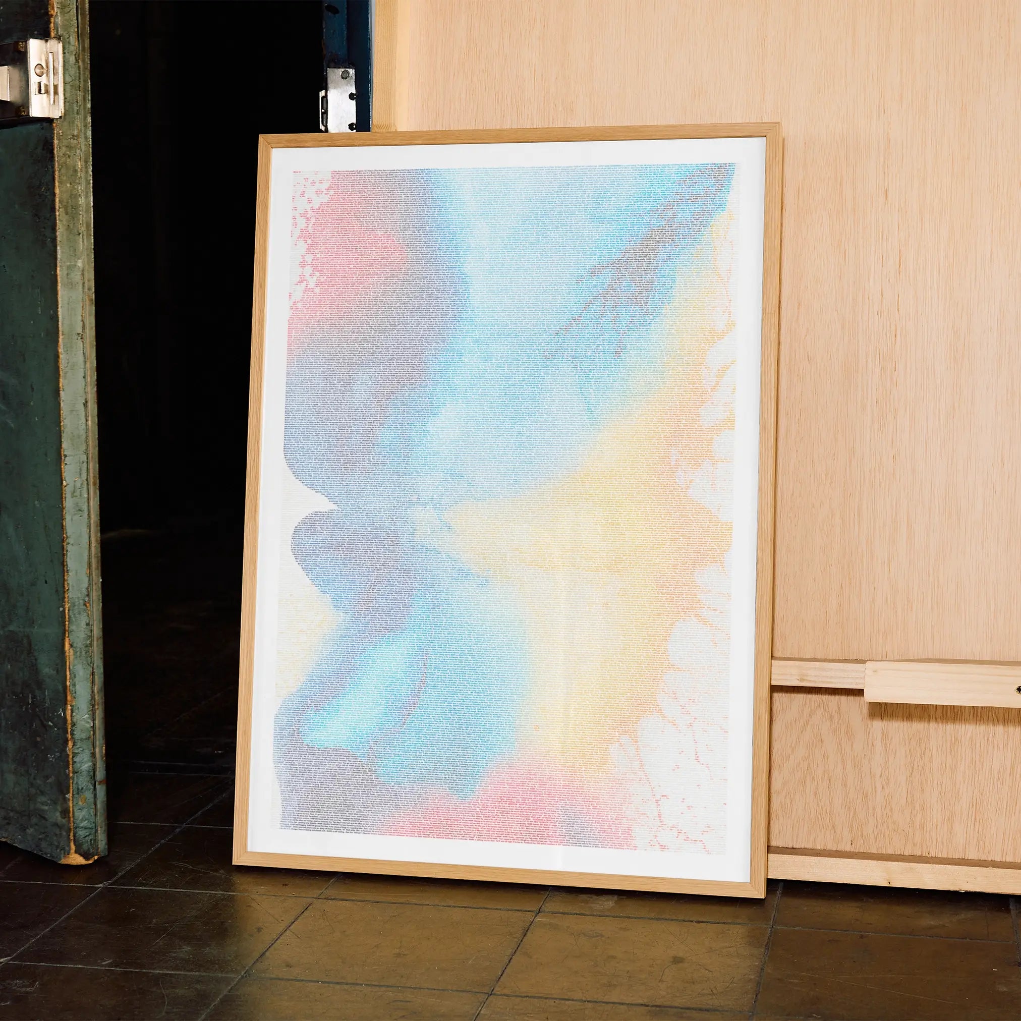A framed The Social Network movie script poster displayed in a contemporary interior setting.