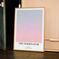 A framed The Terminator movie script poster displayed in a contemporary interior setting.