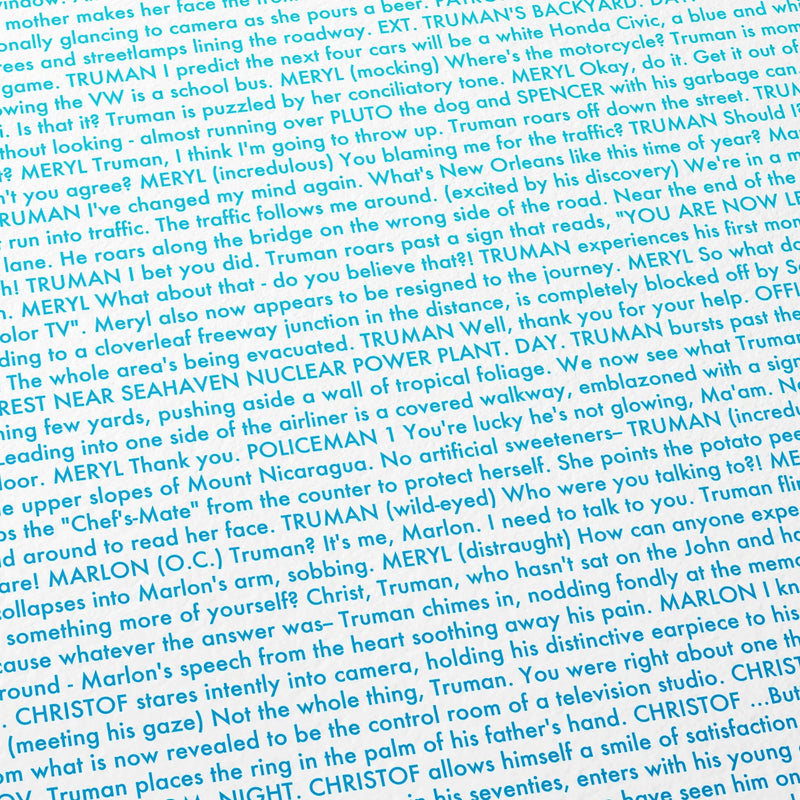 Close-up detail of the The Truman Show movie script poster showing dense typographic text.