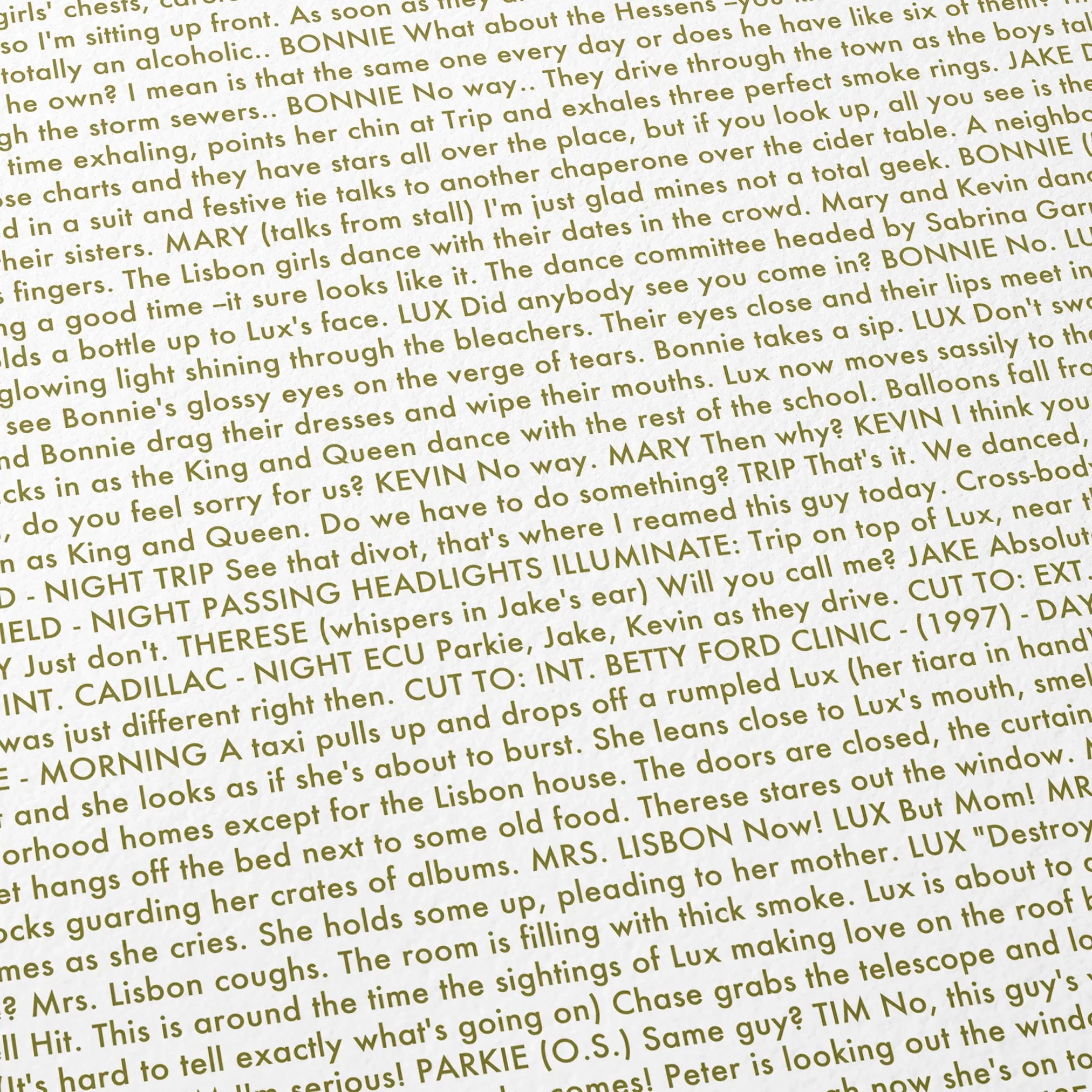 Close-up detail of the The Virgin Suicides movie script poster showing dense typographic text.
