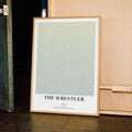A framed The Wrestler movie script poster displayed in a contemporary interior setting.