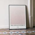 A framed The Zone of Interest movie script poster leaning against a wall in a minimalist interior.