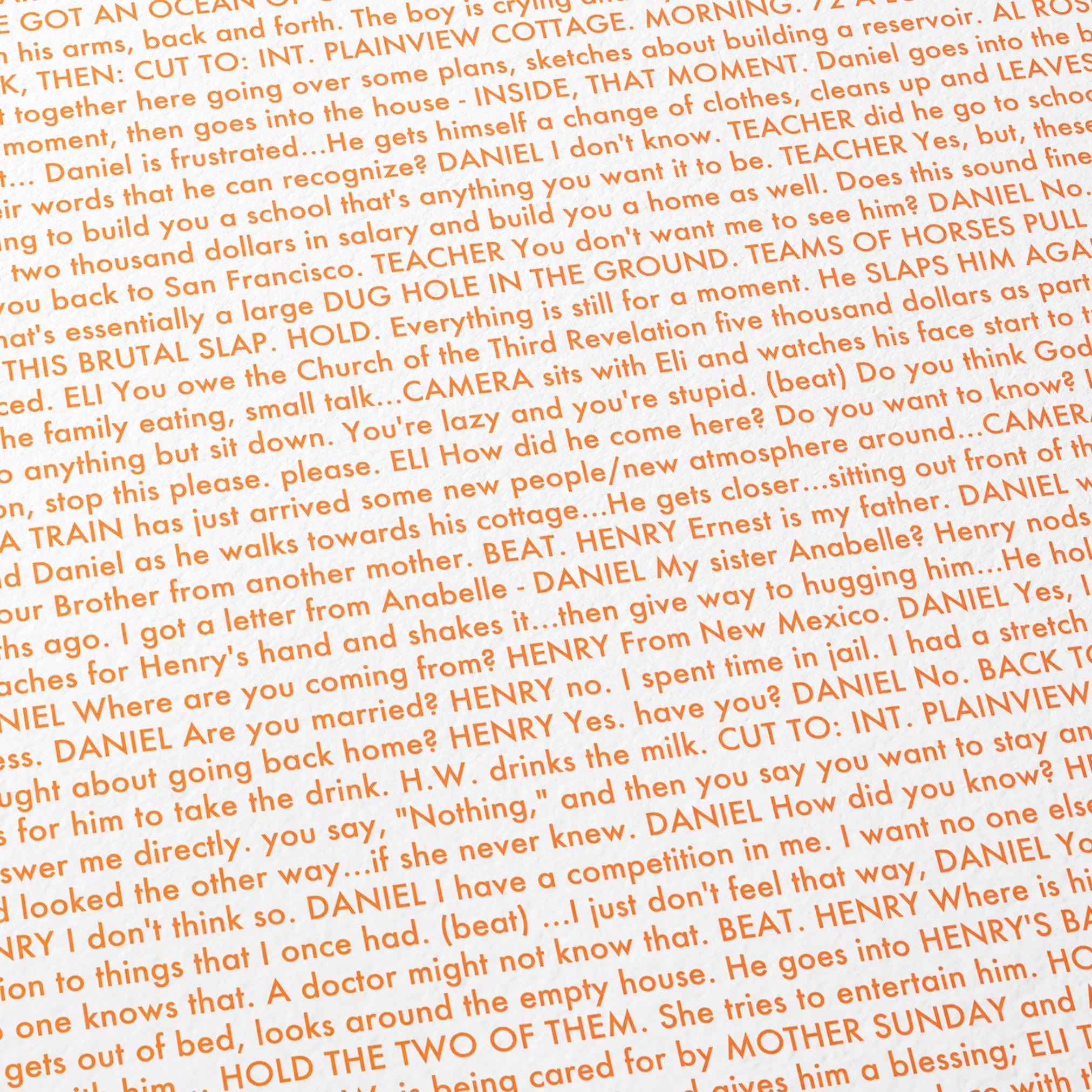 Close-up detail of the There Will Be Blood movie script poster showing dense typographic text.