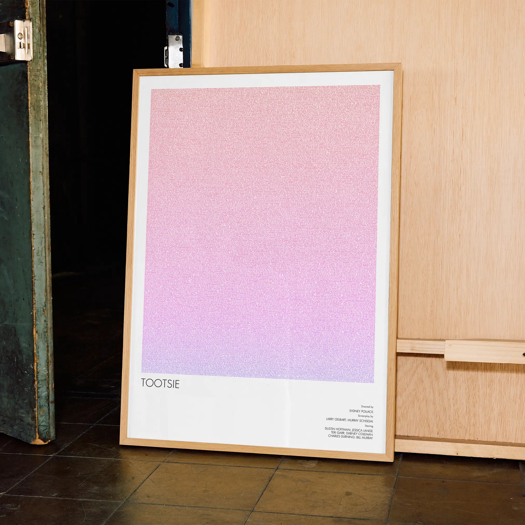 A framed Tootsie movie script poster displayed in a contemporary interior setting.