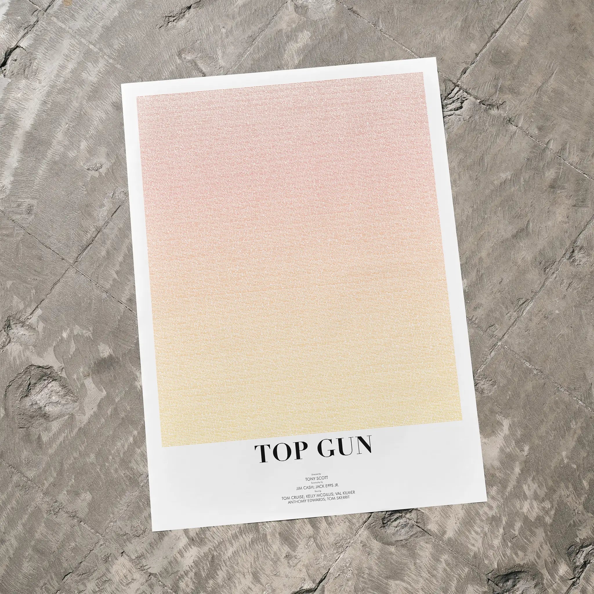 Movie poster for 'Top Gun' on a textured gray surface
