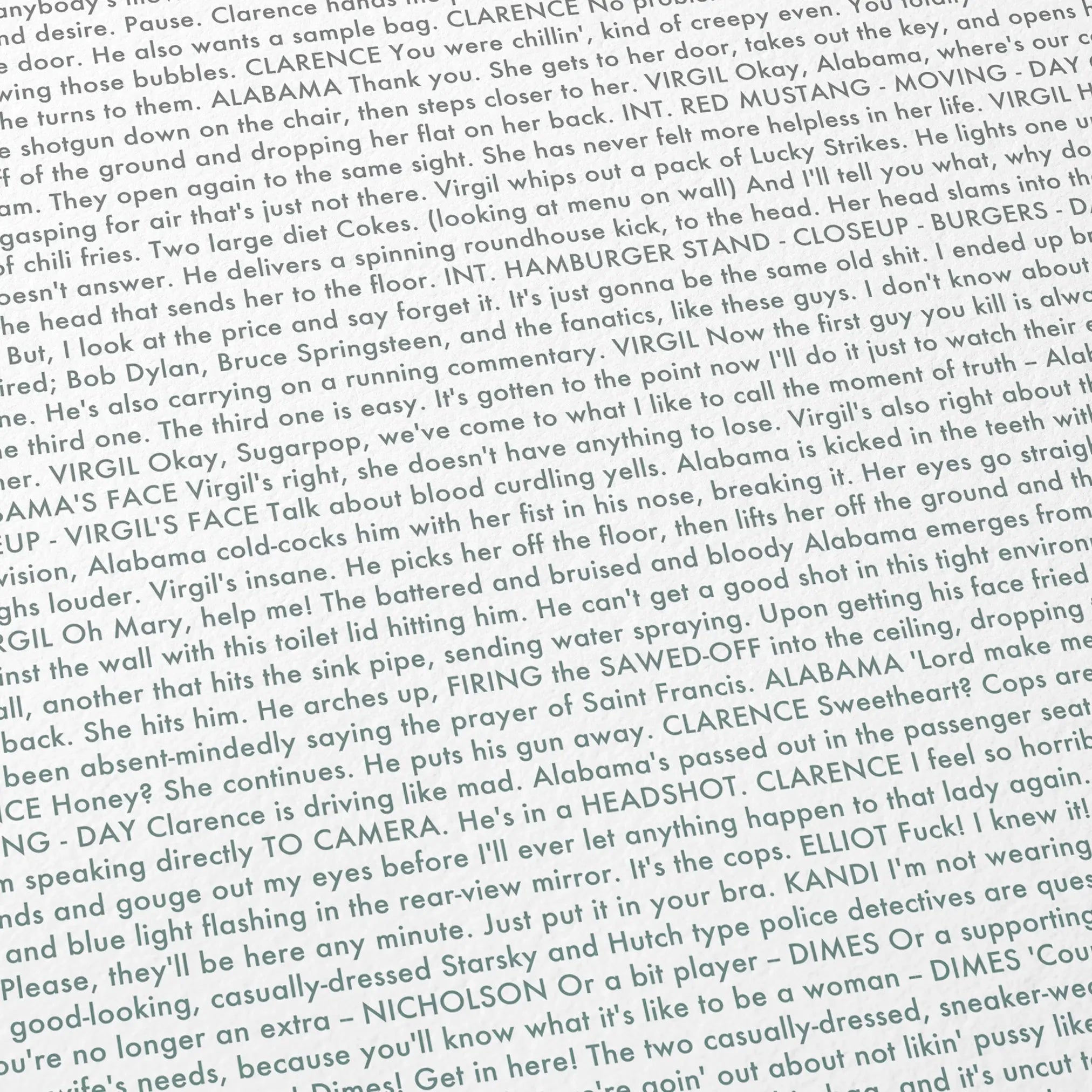 Close-up detail of the True Romance movie script poster showing dense typographic text.