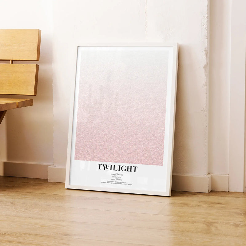 A framed Twilight movie script poster leaning against a wall in a modern interior.