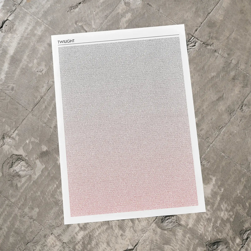 A Twilight movie script poster laid flat on a textured floor surface.