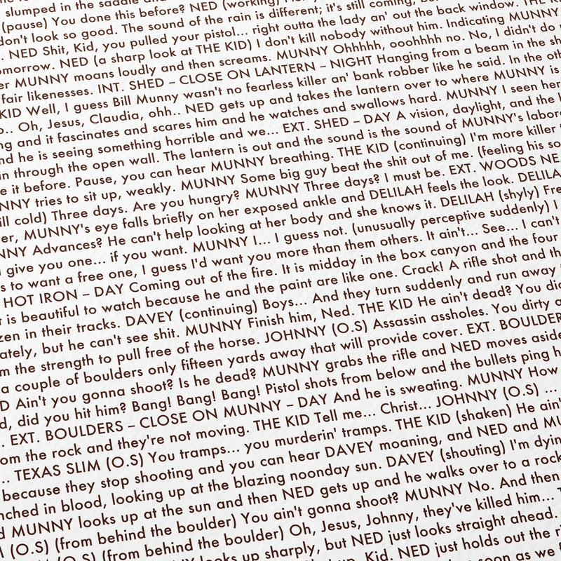 Close-up detail of the Unforgiven movie script poster showing dense typographic text.