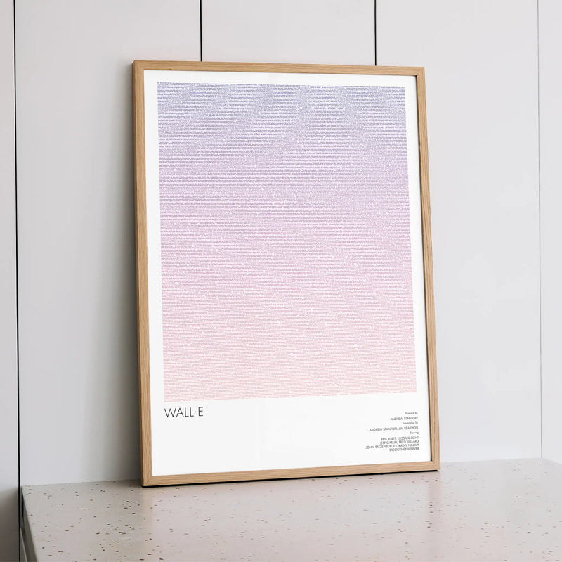 A framed WALL·E movie script poster styled within a calm interior space.