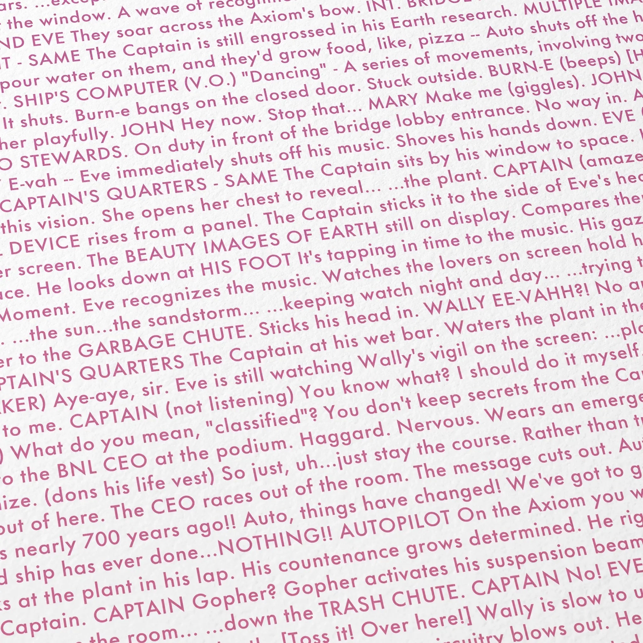 Close-up detail of the WALL·E movie script poster showing dense typographic text.