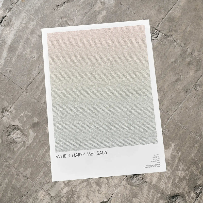 A When Harry Met Sally... movie script poster laid flat on a textured floor surface.