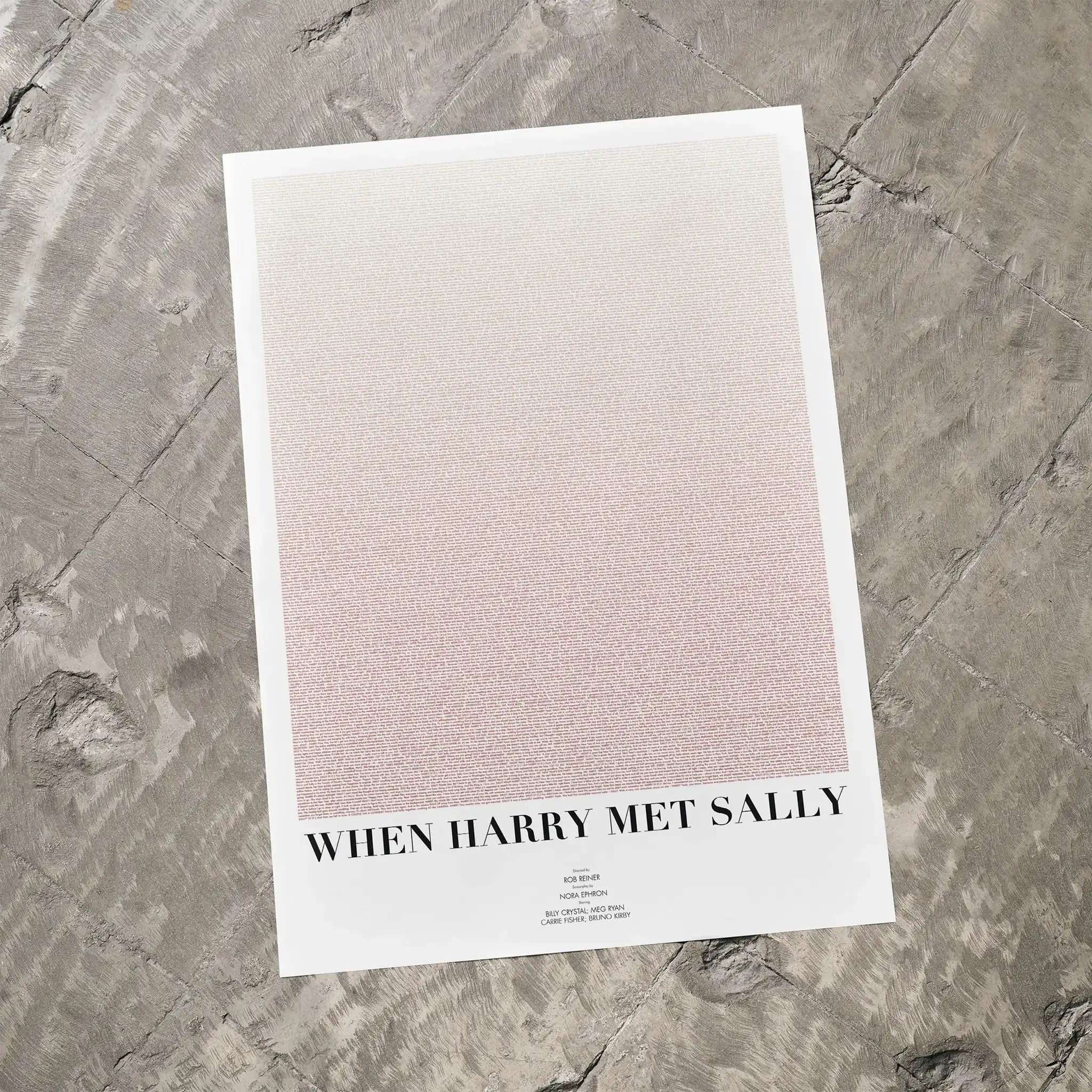 A When Harry Met Sally movie script poster laid flat on a textured floor surface.