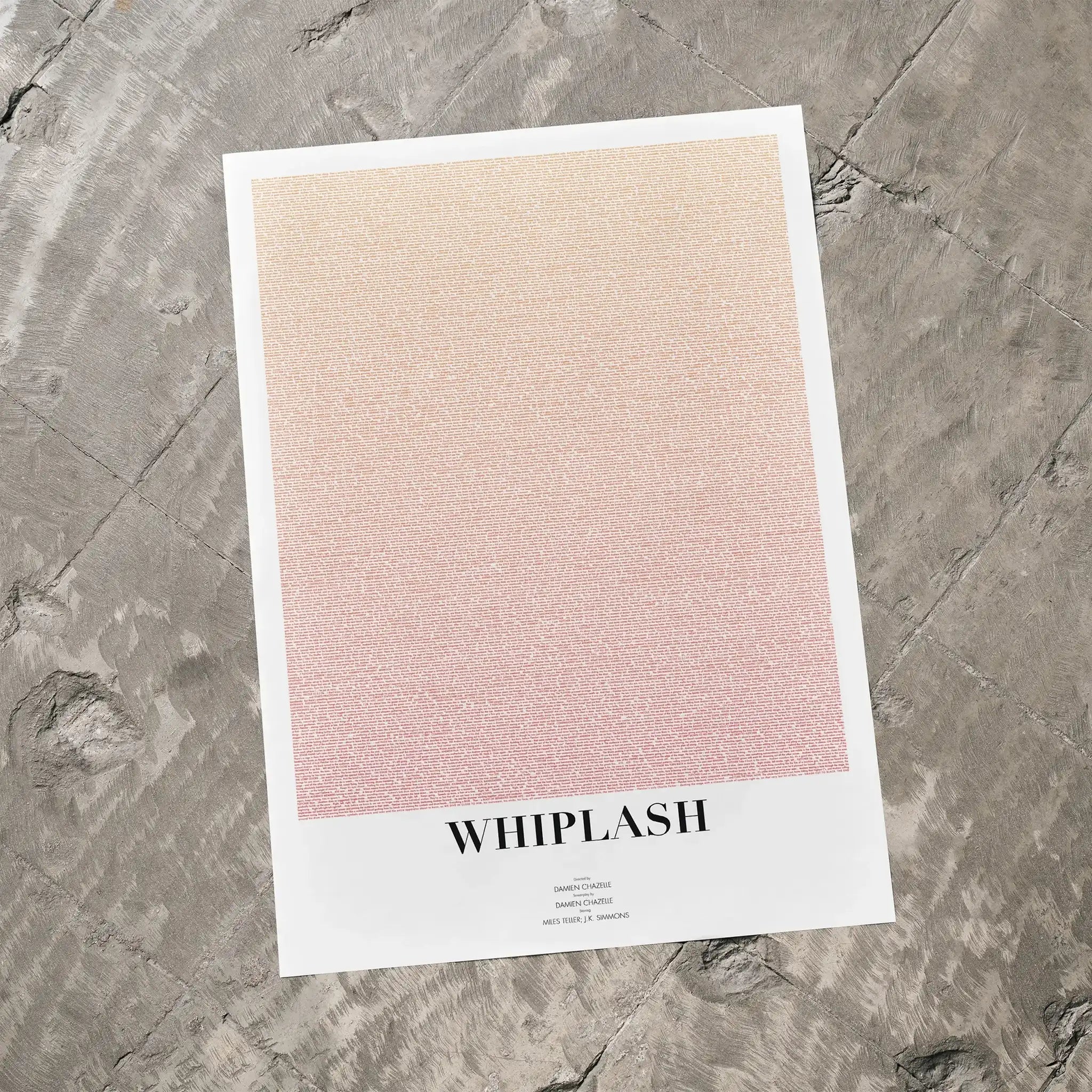 A Whiplash movie script poster laid flat on a textured floor surface.