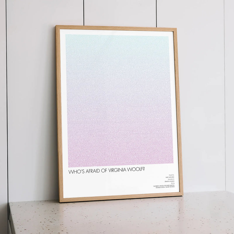 A framed Who's Afraid of Virginia Woolf? movie script poster styled within a calm interior space.