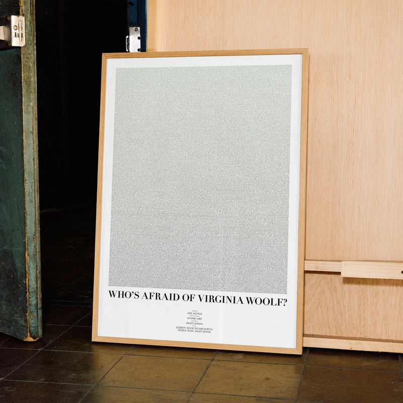A framed Who's Afraid of Virginia Woolf? movie script poster displayed in a contemporary interior setting.