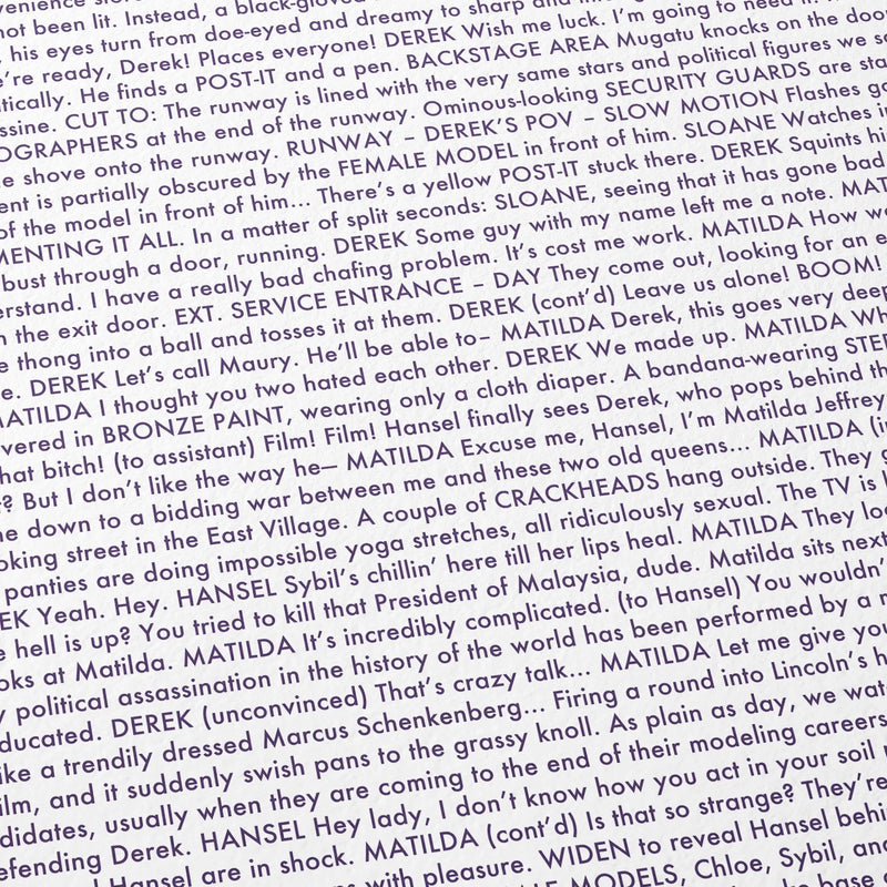 Close-up detail of the Zoolander movie script poster showing dense typographic text.