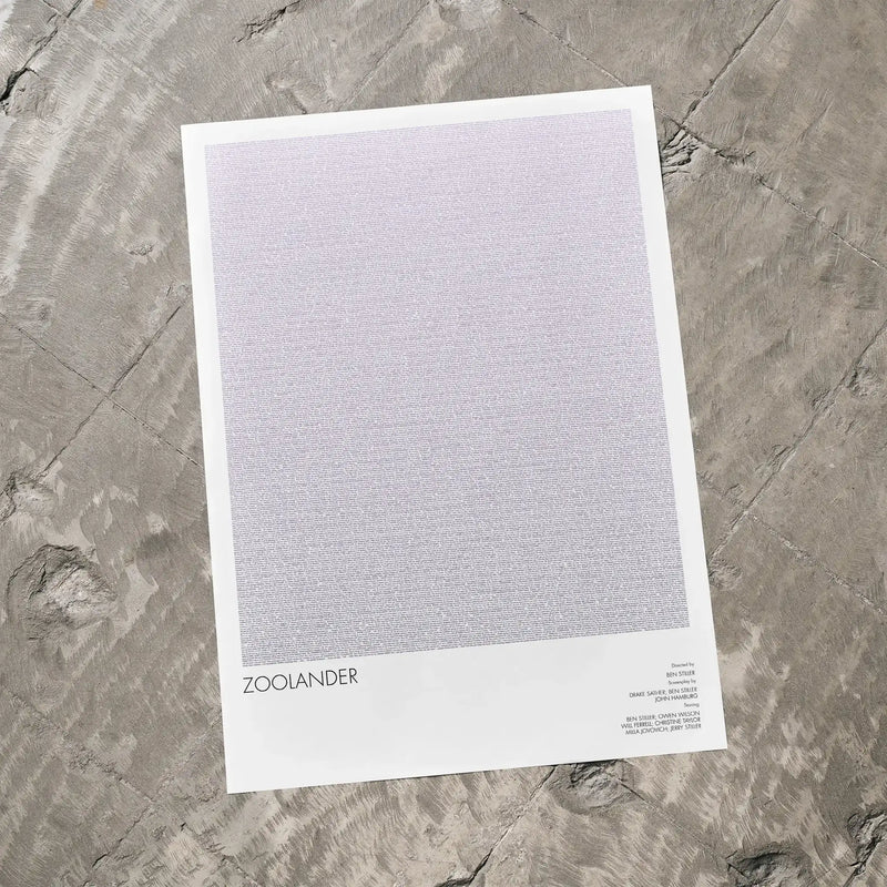A Zoolander movie script poster laid flat on a textured floor surface.