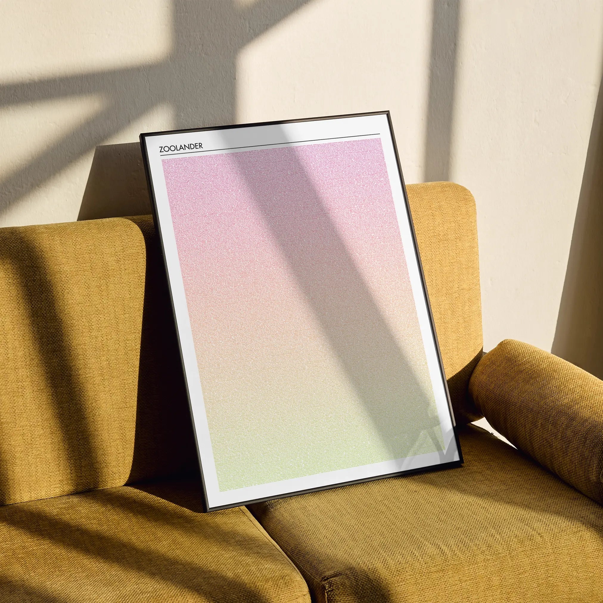 A framed Zoolander movie script poster styled in a clean interior setting.